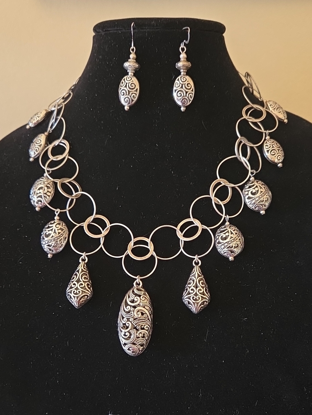 Ornate Silver-Tone Filigree Pendant Necklace with Matching Earrings